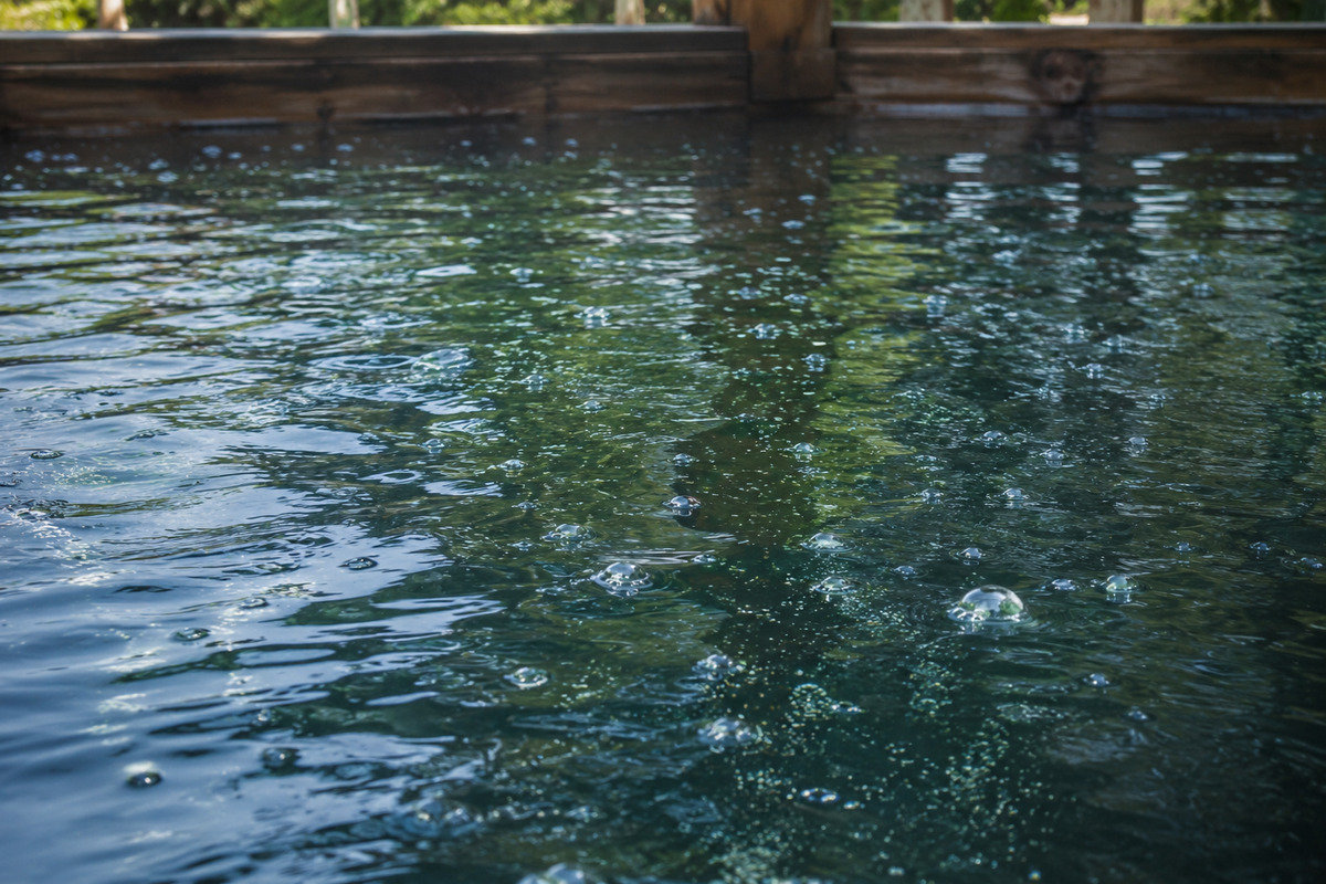 Wooden pool directly above the spring